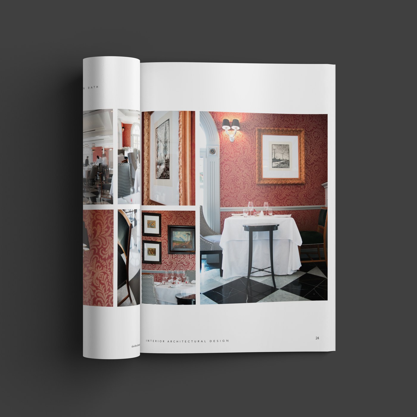 A hotel restaurant in the monograph, patterned red walls and a chandelier over the tables.